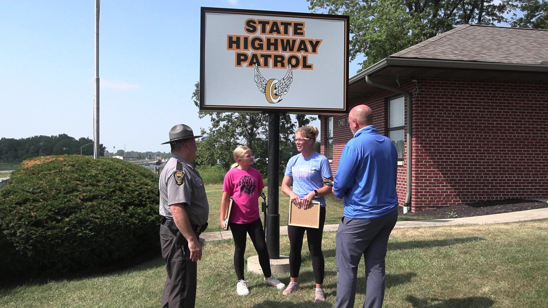 Brynne and Kristen Stechschulte receive “Saved by the Belt” award following January car crash